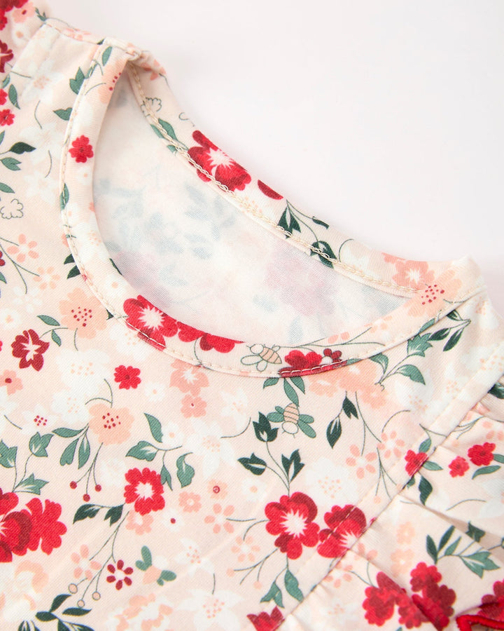 Floral girls twirl dress with Peter Pan collar and red piping neckline