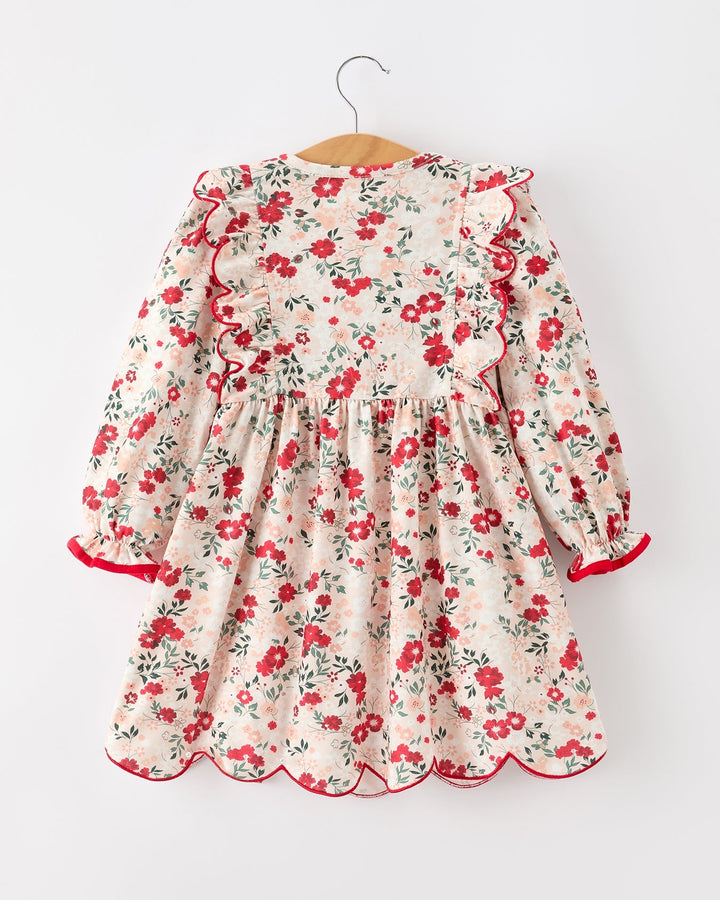 Girls floral twirl dress with gathered skirt and red ribbon ties, long sleeves