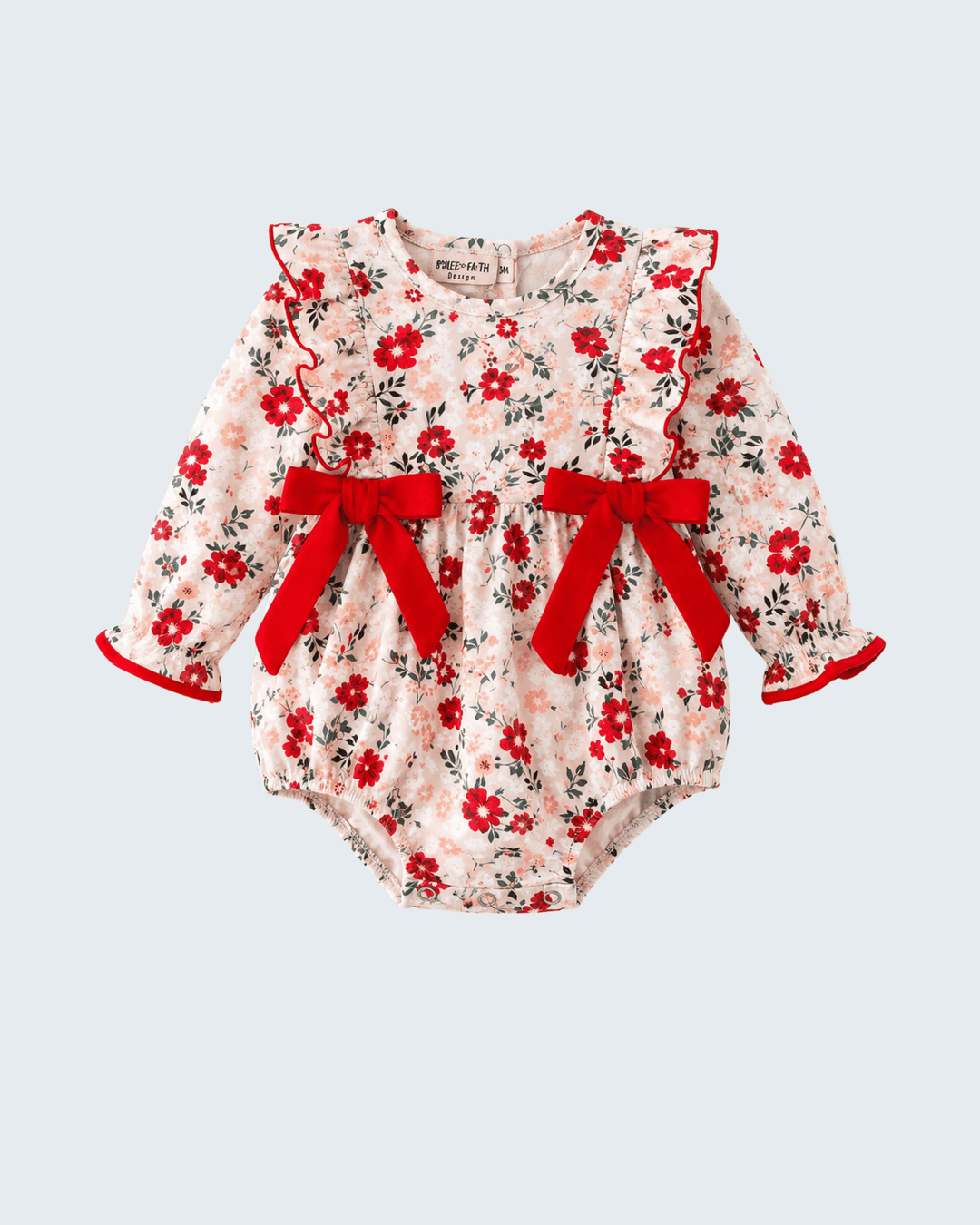 Floral ruffle bow romper with red flower print, puff sleeves, and red waist bows