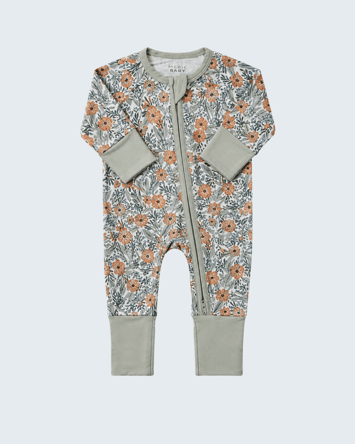 Bamboo zipper romper with orange floral print, long sleeves, gray cuffs and leg bands.