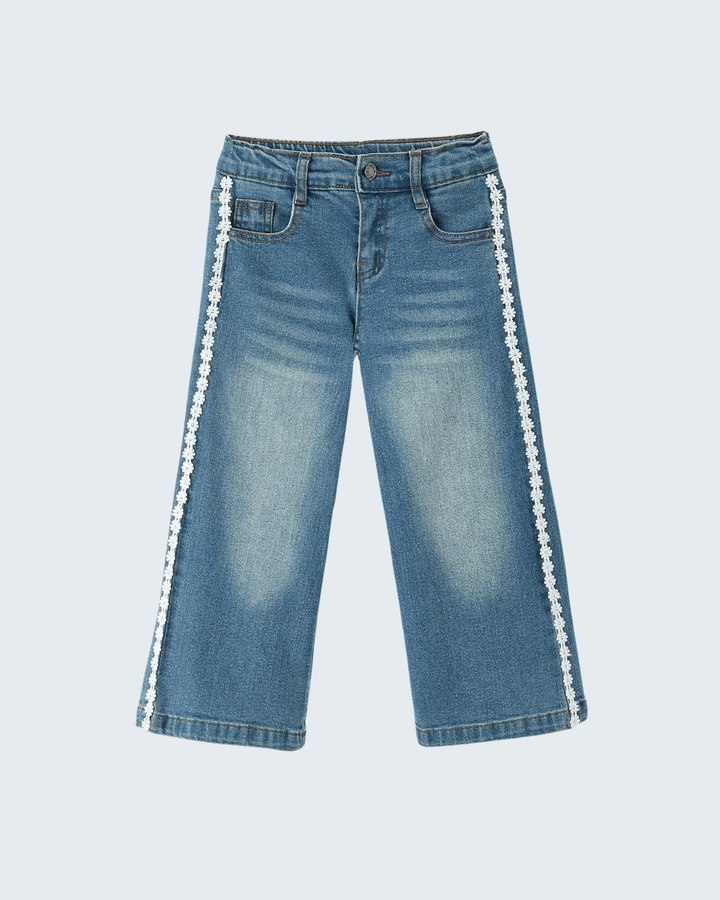 Light blue wide-leg jeans with daisy lace trim along the outer leg seams