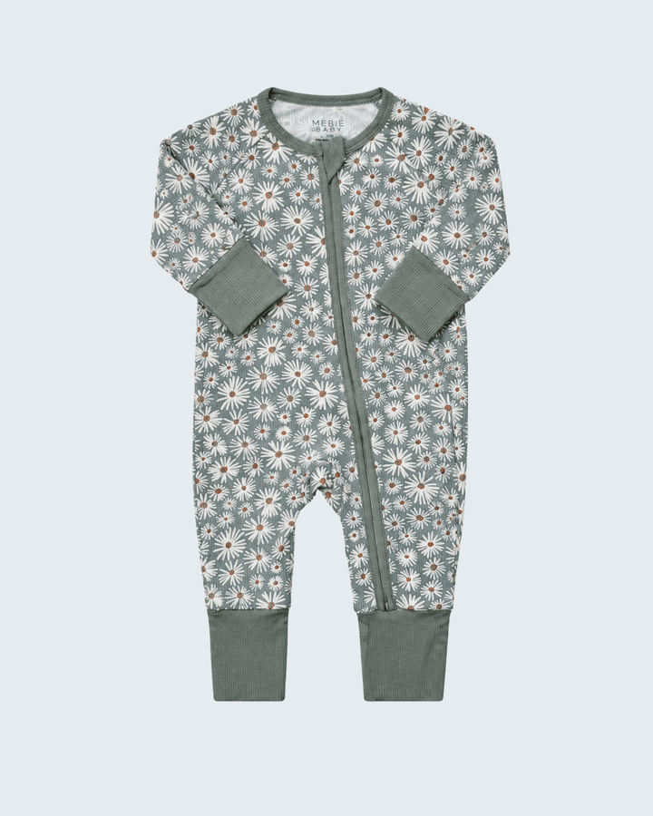Daisy print zipper romper with long sleeves, dark green zip front and cuffs
