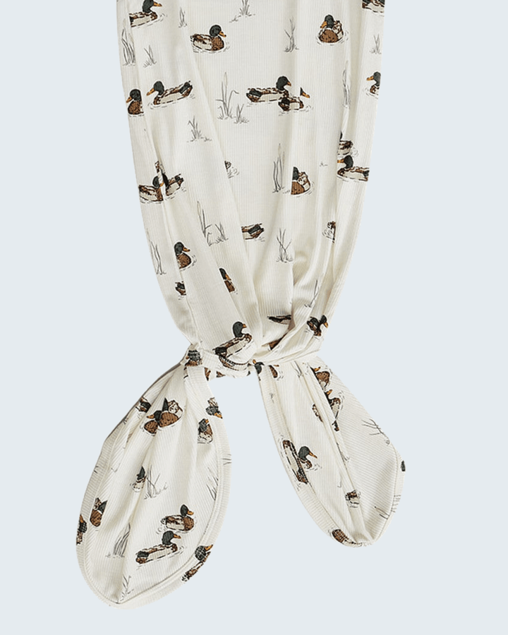Cream ribbed bamboo knot gown with duck print and tied bottom hems
