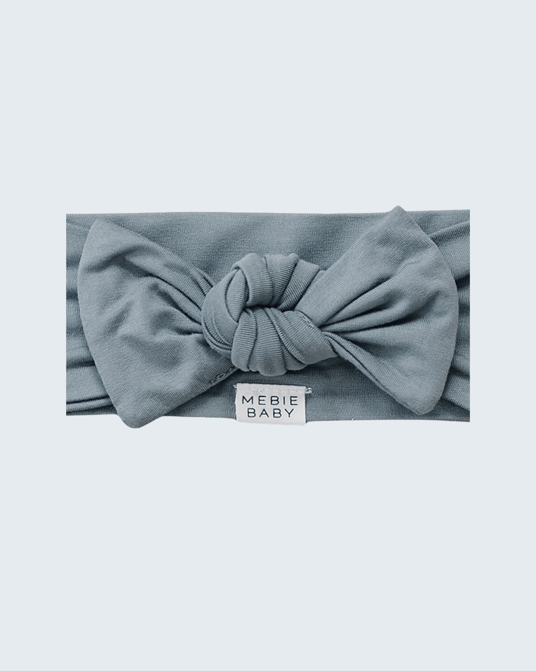 Dusty blue bamboo head wrap with knotted bow and MEBIE BABY label