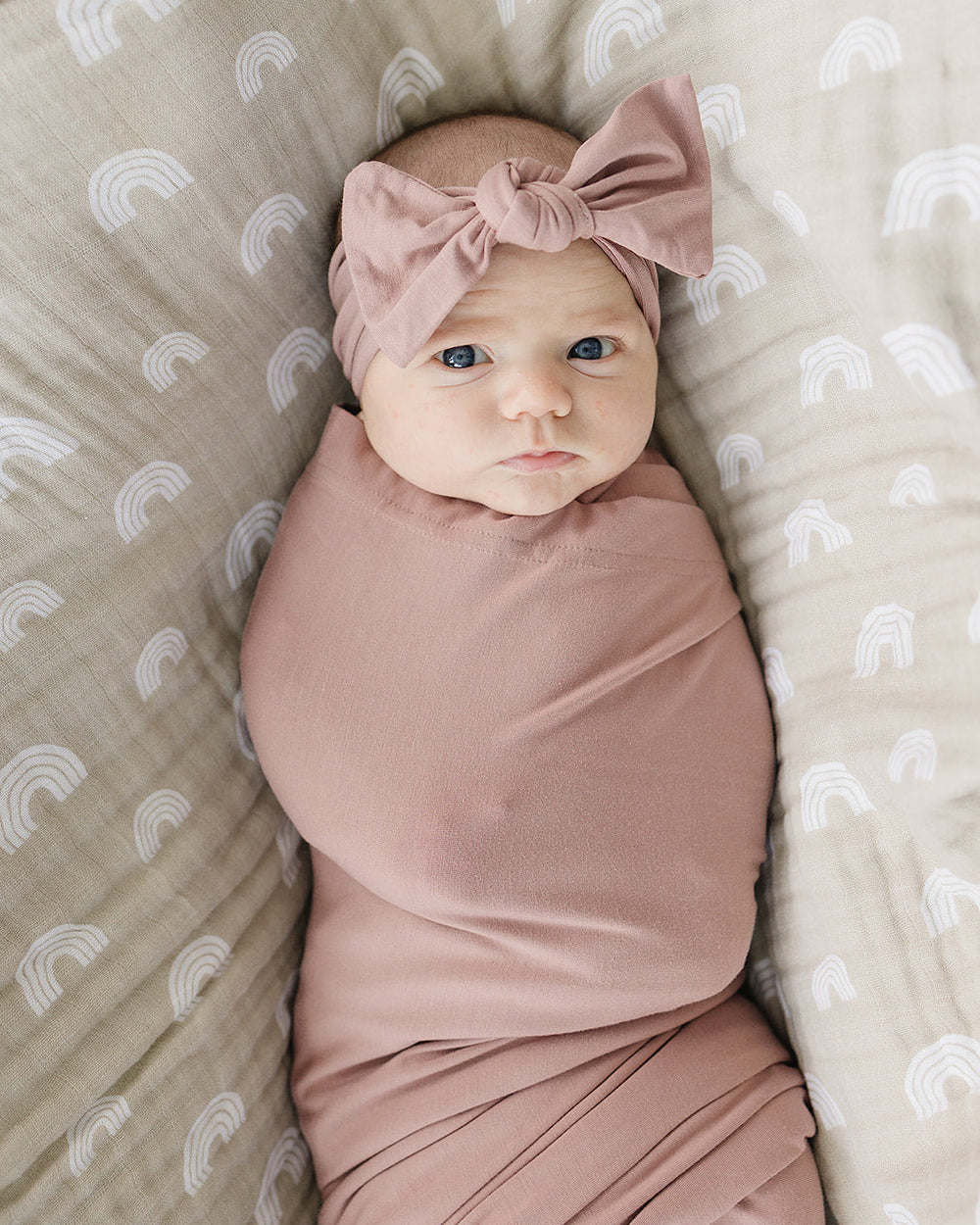 Dusty rose knotted baby head wrap with bow at the front