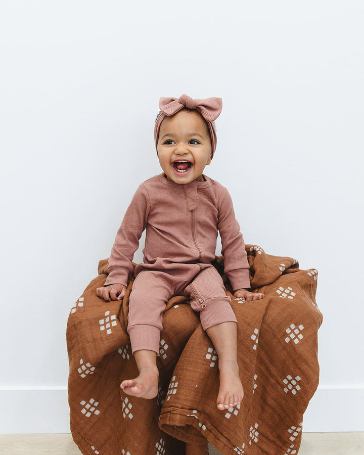 Dusty rose ribbed head wrap with top knot on toddler