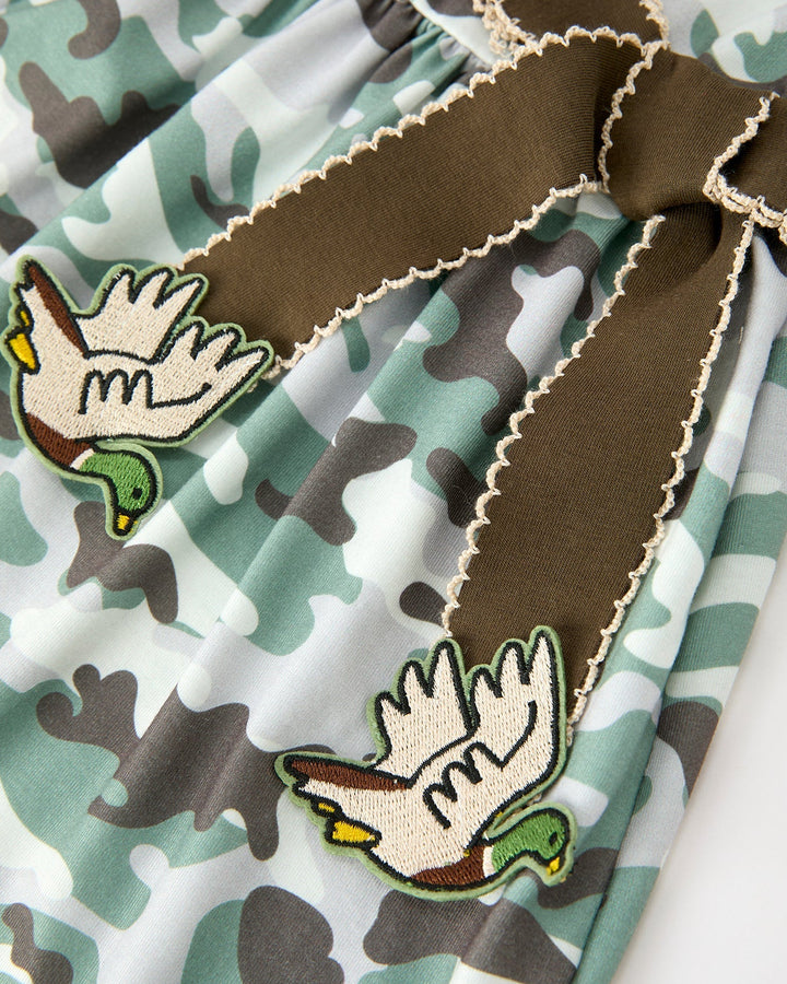 Camo twirl dress with brown trim and embroidered cartoon bird and mouse patches