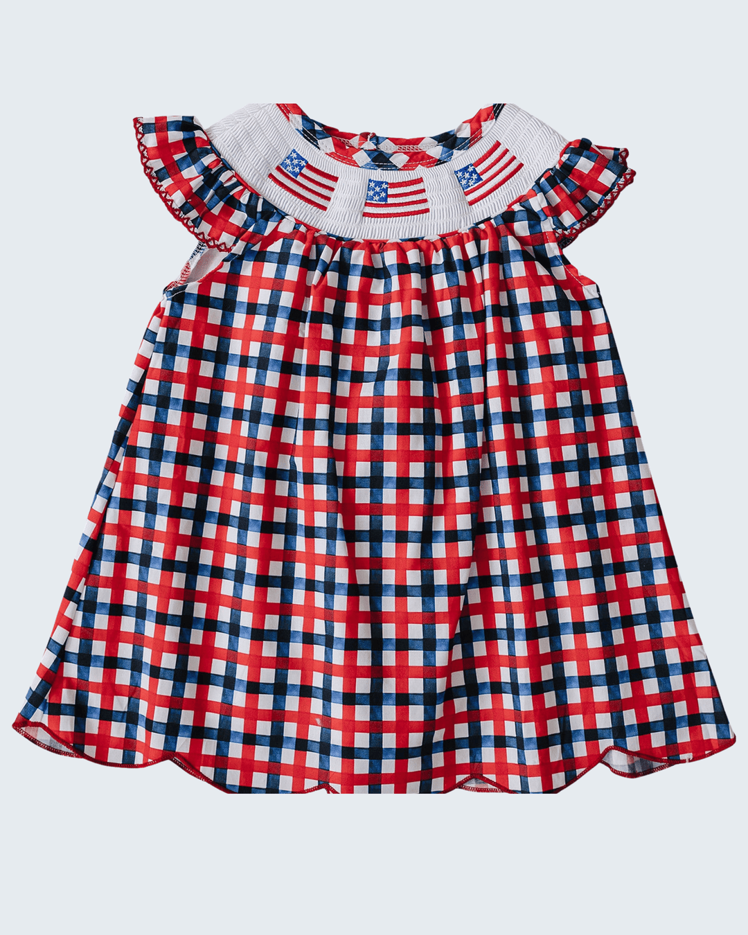 Red, white, and blue checkered dress with American flag details on a white background