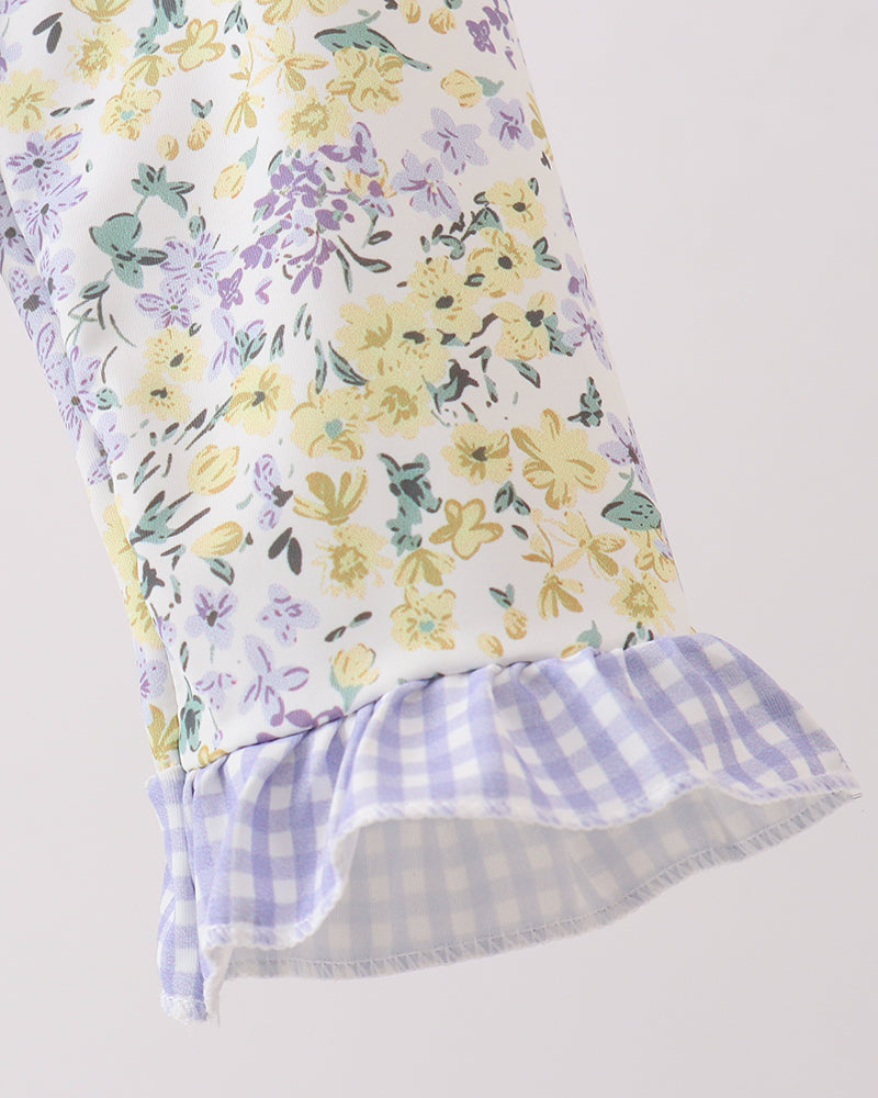 Floral swimsuit sleeve on grey background