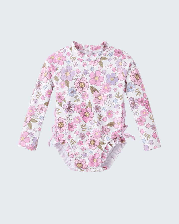 Floral-patterned baby swimsuit on a light gray background