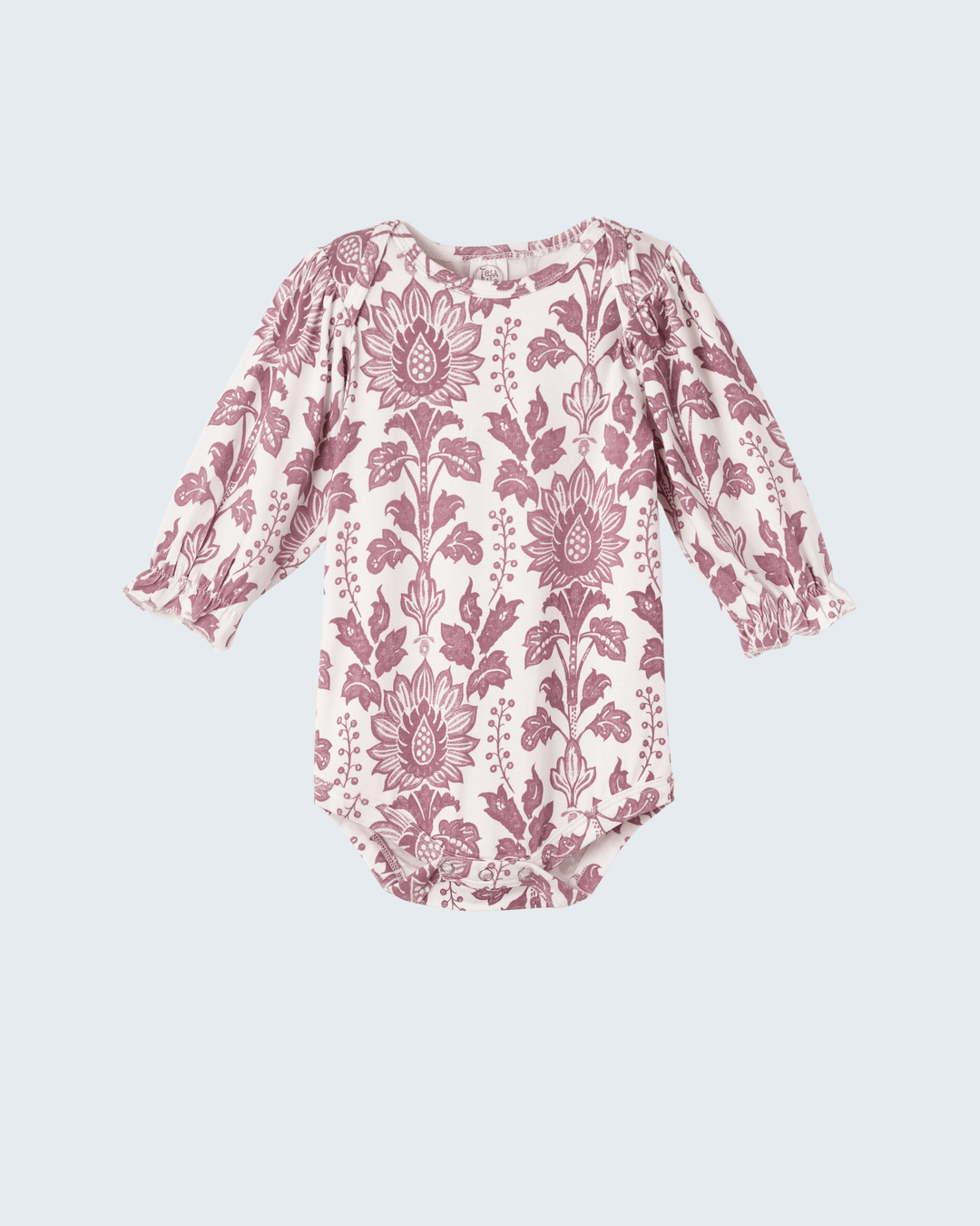 Light pink baby bodysuit with maroon floral tapestry print, long sleeves