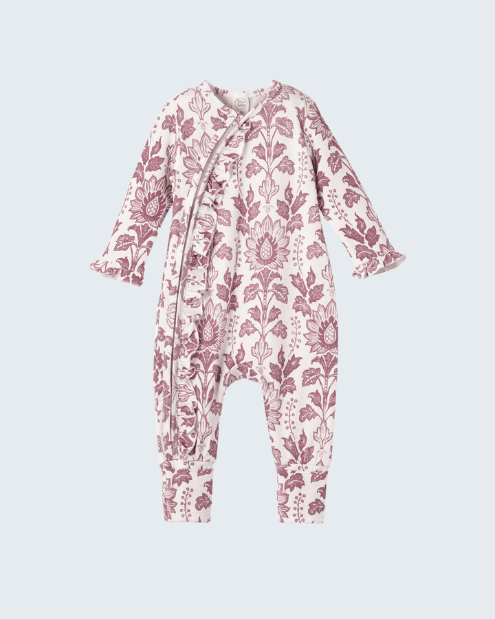 Light pink floral bamboo zipper romper with long sleeves and front zip