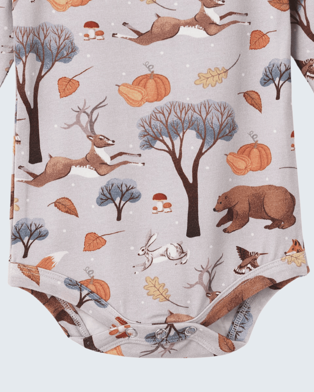 Light gray baby bodysuit with woodland print and snap-button bottom
