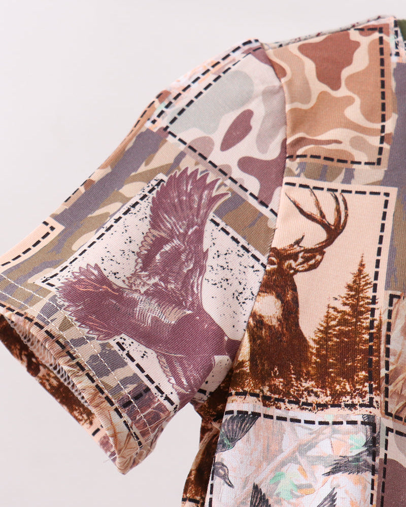 Woodland-print pajama fabric with deer, trees, and patchwork blocks