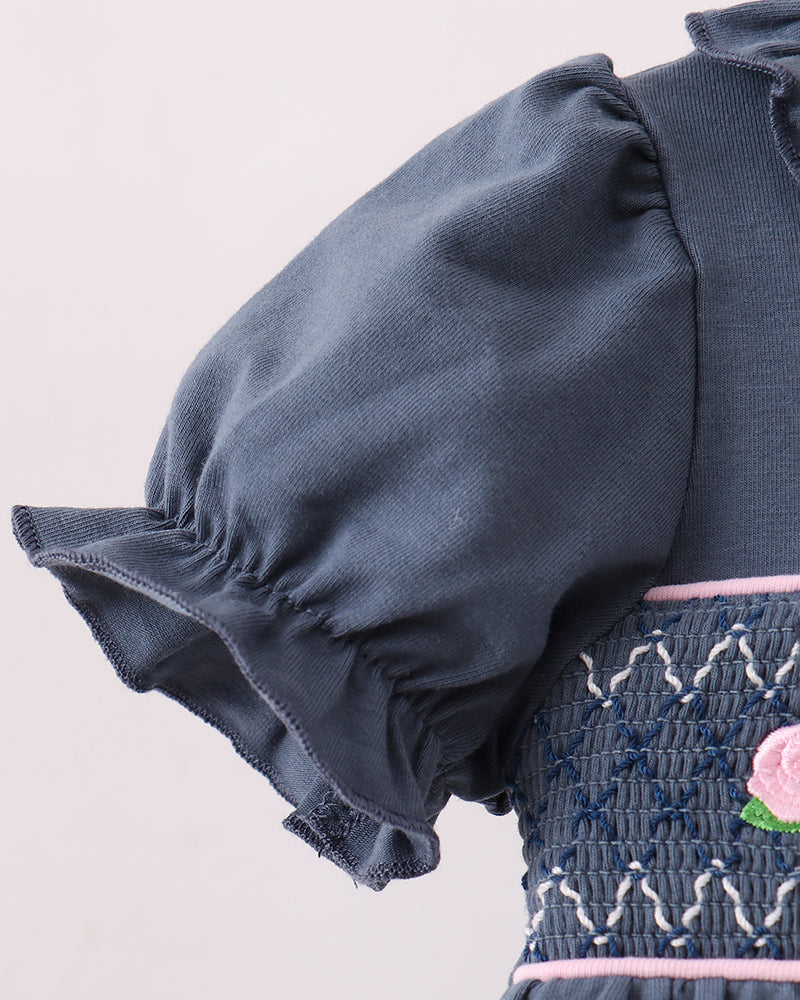 Navy ruffled sleeve top with elastic puff cuff and smocked bloomer at waist