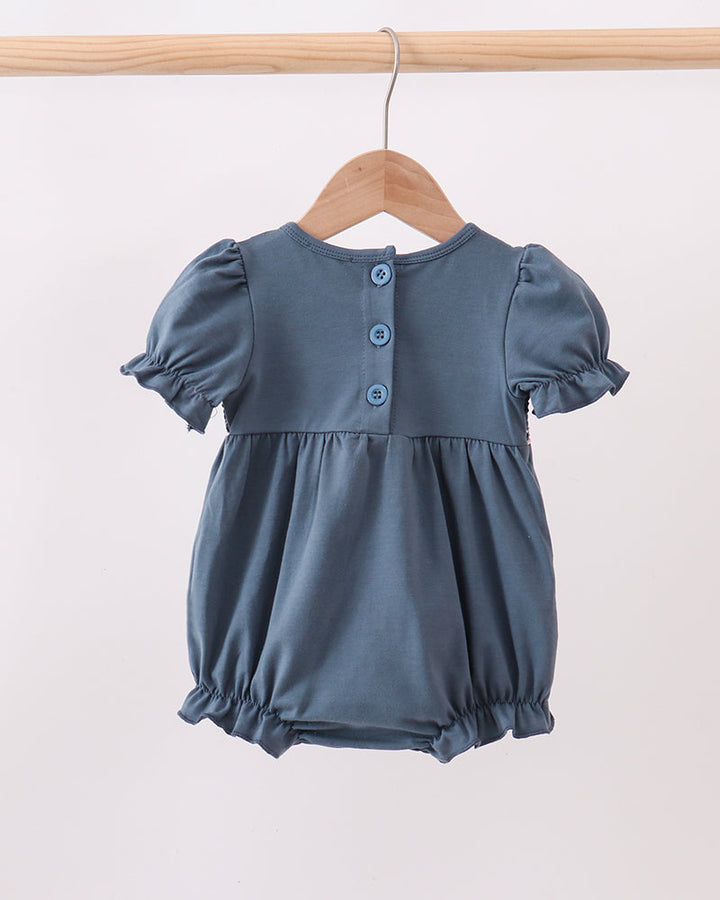 Dark blue bubble romper with short puff sleeves and center-button placket