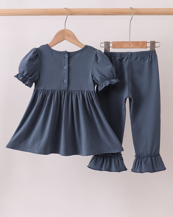 Dark blue ruffle peplum top with button back and matching pants set