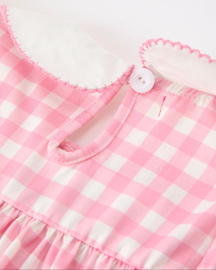 Girls pink gingham dress close-up of button placket and gathered yoke