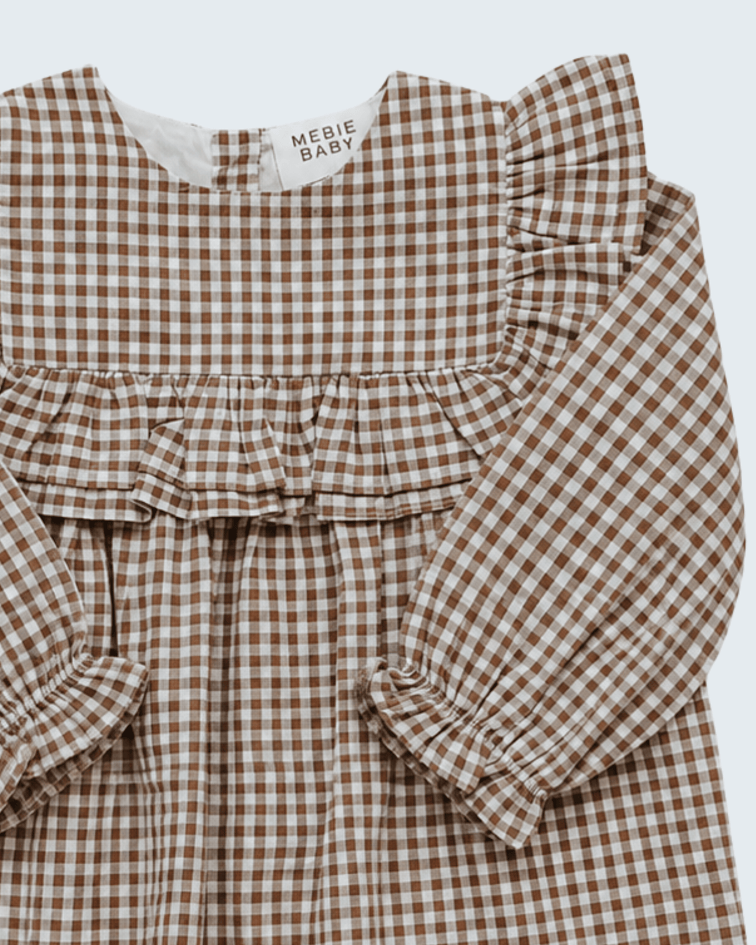 Brown-and-white gingham ruffle dress with gathered yoke and long puff sleeves