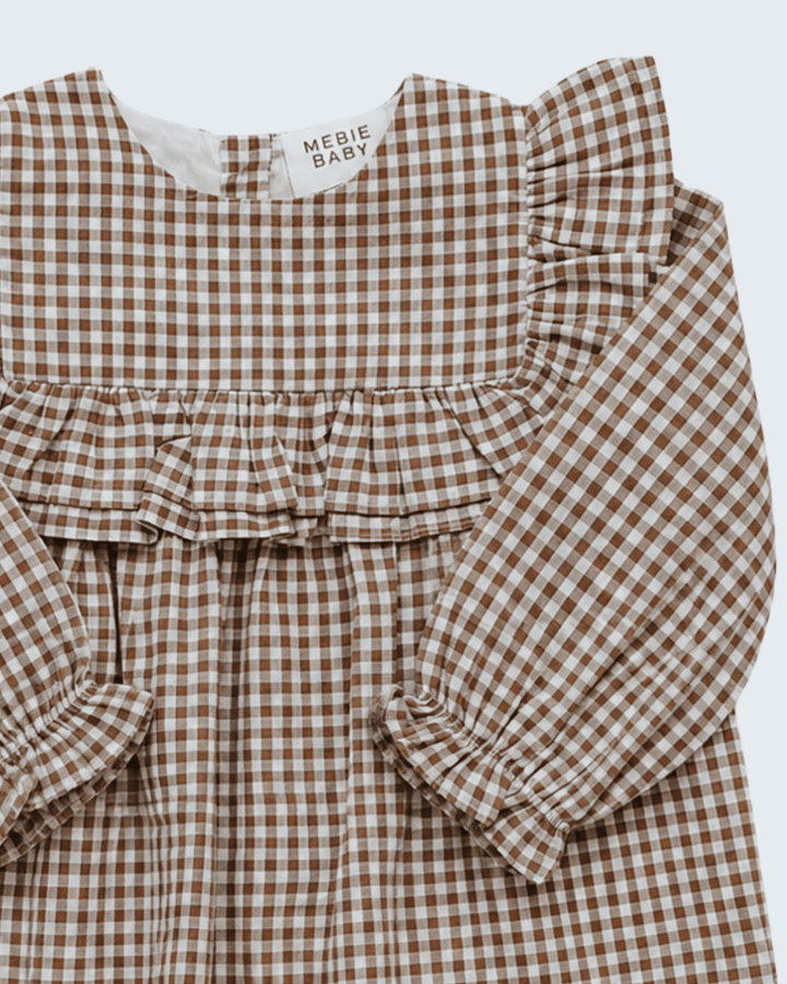 Brown-and-white gingham ruffle dress with gathered yoke and long puff sleeves