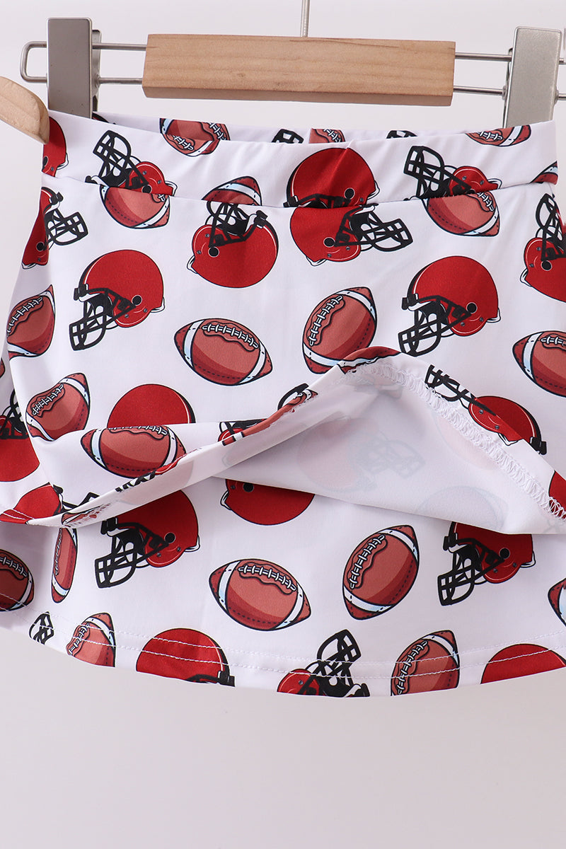 Fabric with football and helmet pattern on a white background