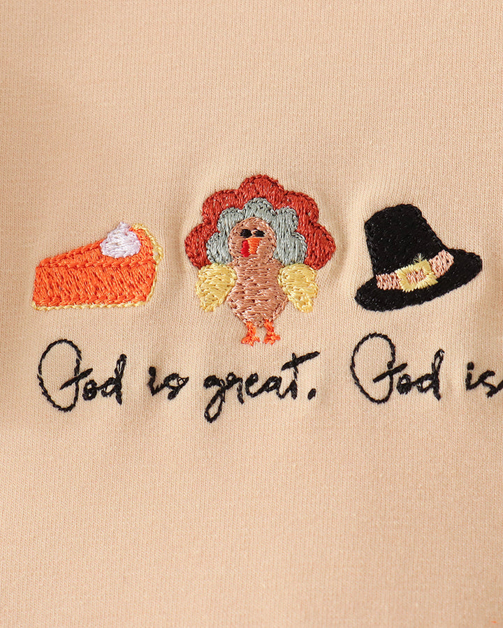 Beige embroidery front with God is great, God is good figures and hats