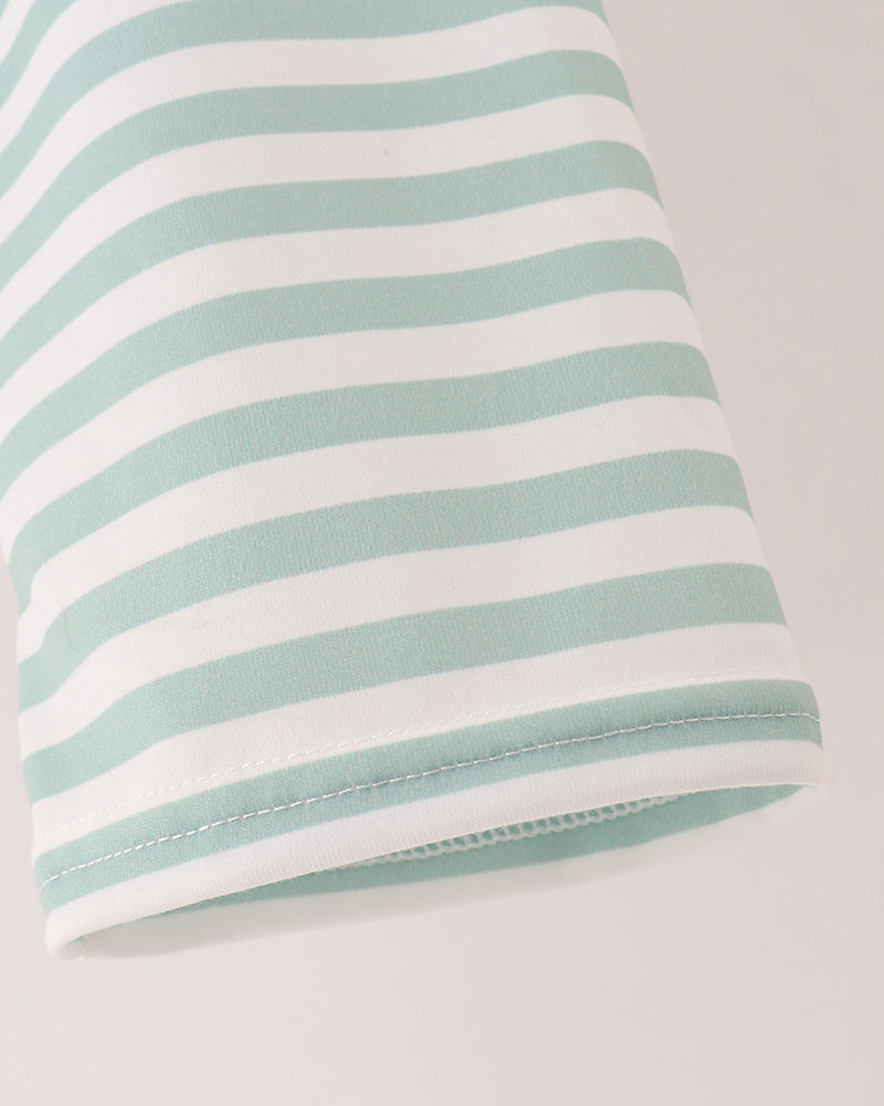 Mint-and-white striped pants with elastic waist and stitched hem detail