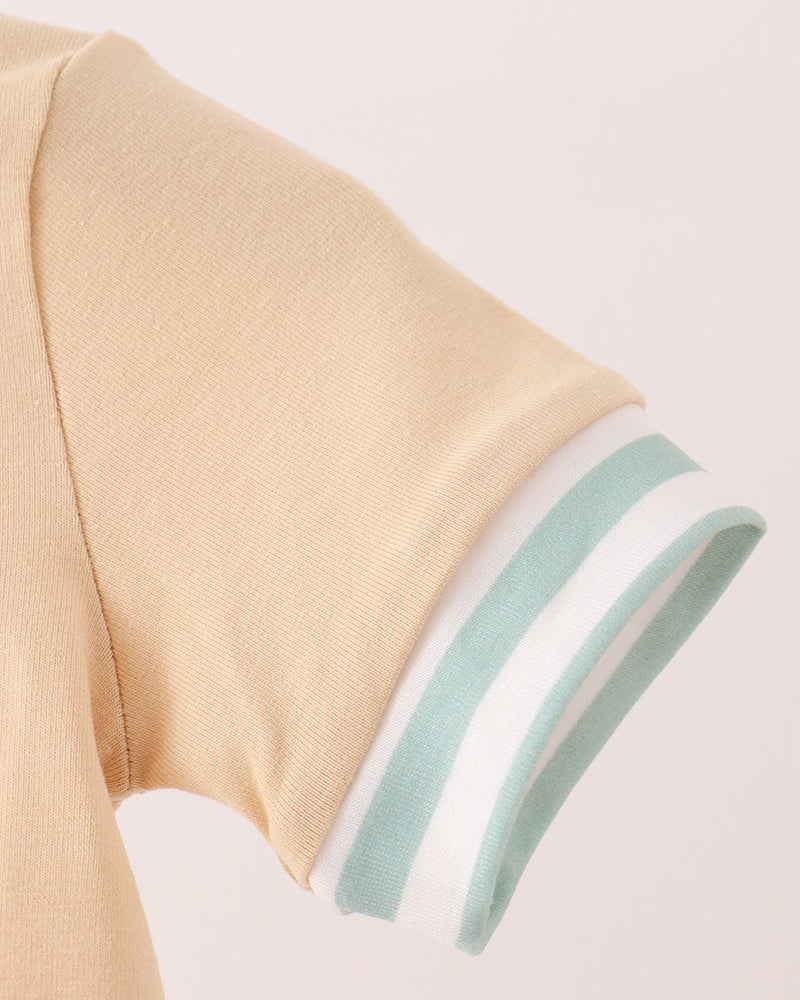 Beige romper with short sleeve and light blue striped cuff trim