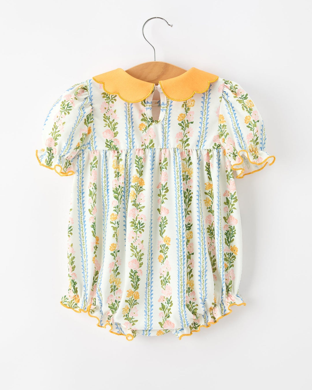 Baby girl romper with scallop orange collar and puff sleeves, blue floral stripe pattern.
