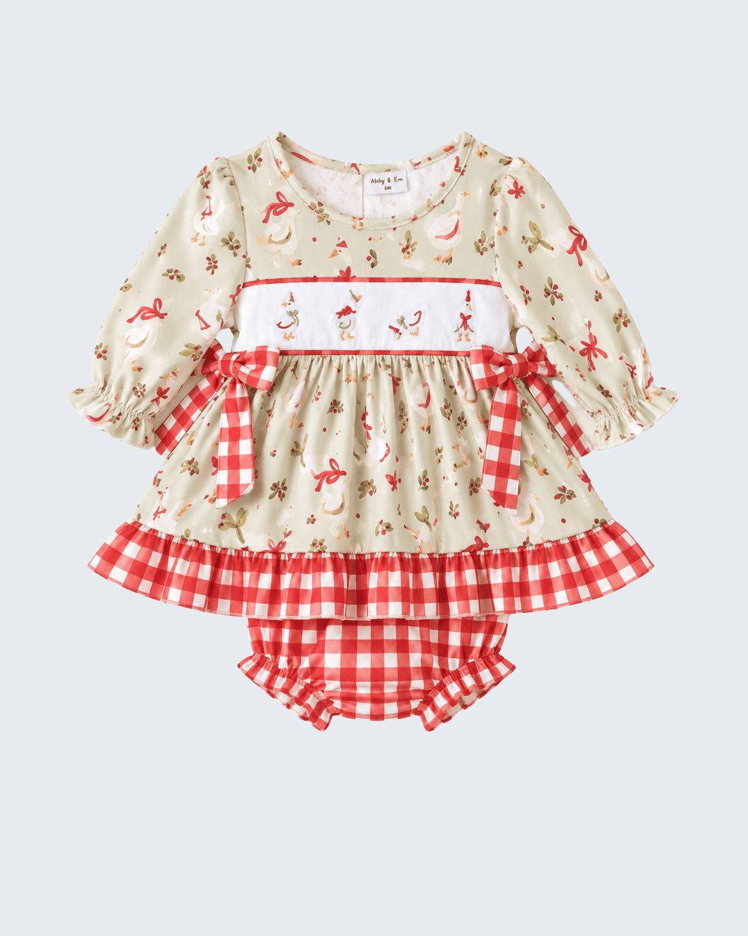 Cream baby bloomer set with long-sleeve ruffle top, red animal print, and gingham bottoms