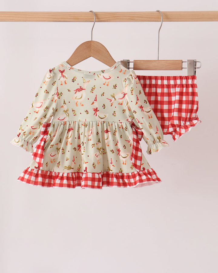 Baby ruffle bloomer set with cream animal print, red accents, and gingham bottoms