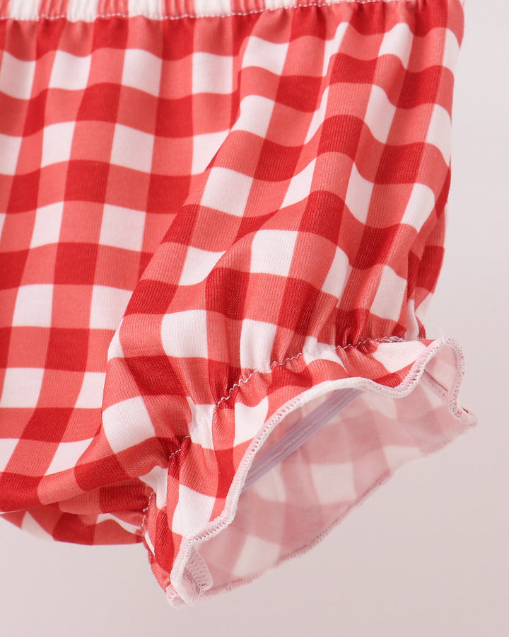 Red gingham baby bloomer shorts with ruffled, lace-trim cuffs