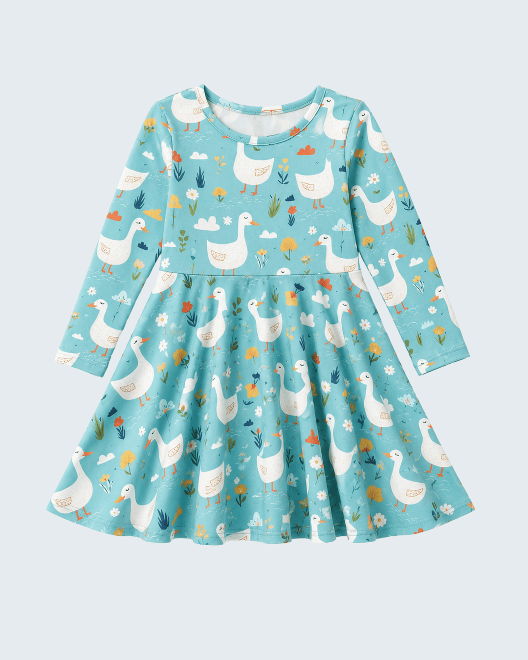 Children's dress with duck pattern on a light blue background