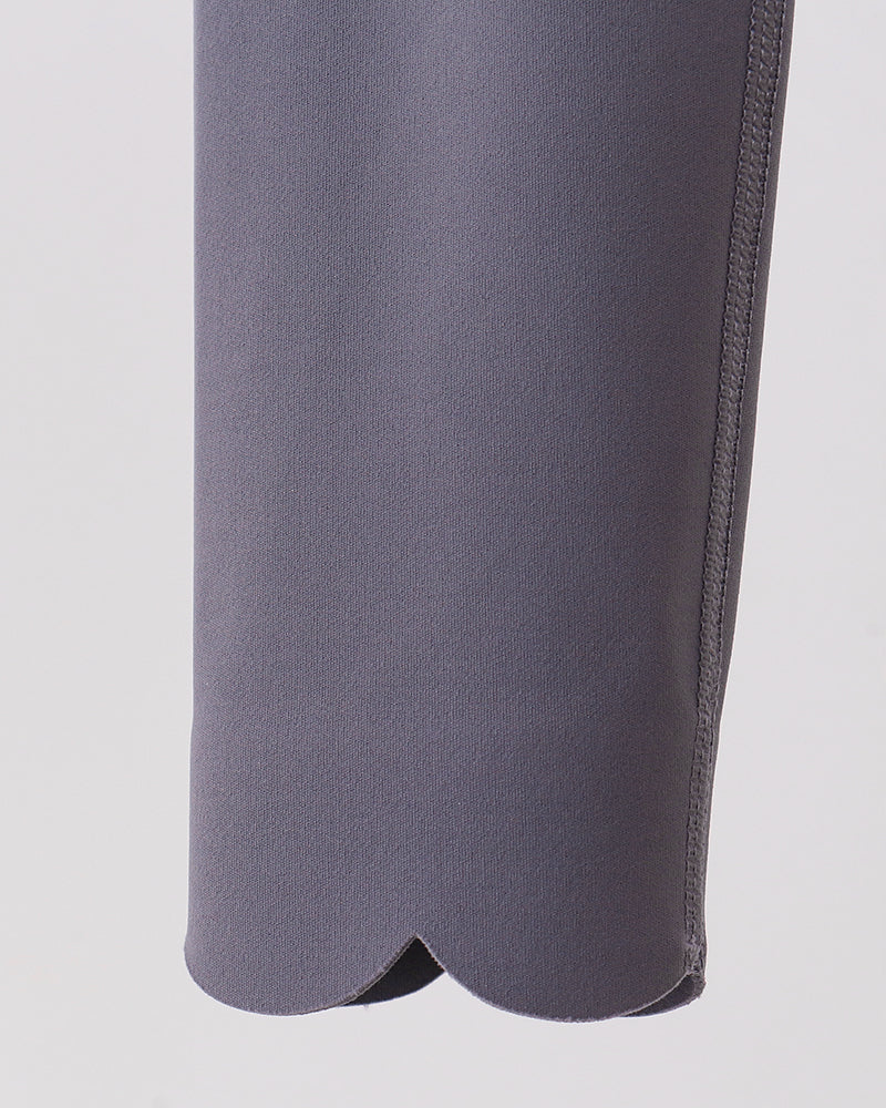 Close-up of a gray leggings on a light gray background