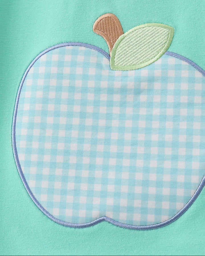 Apple applique embroidery on mint green T-shirt with blue check body and leaf