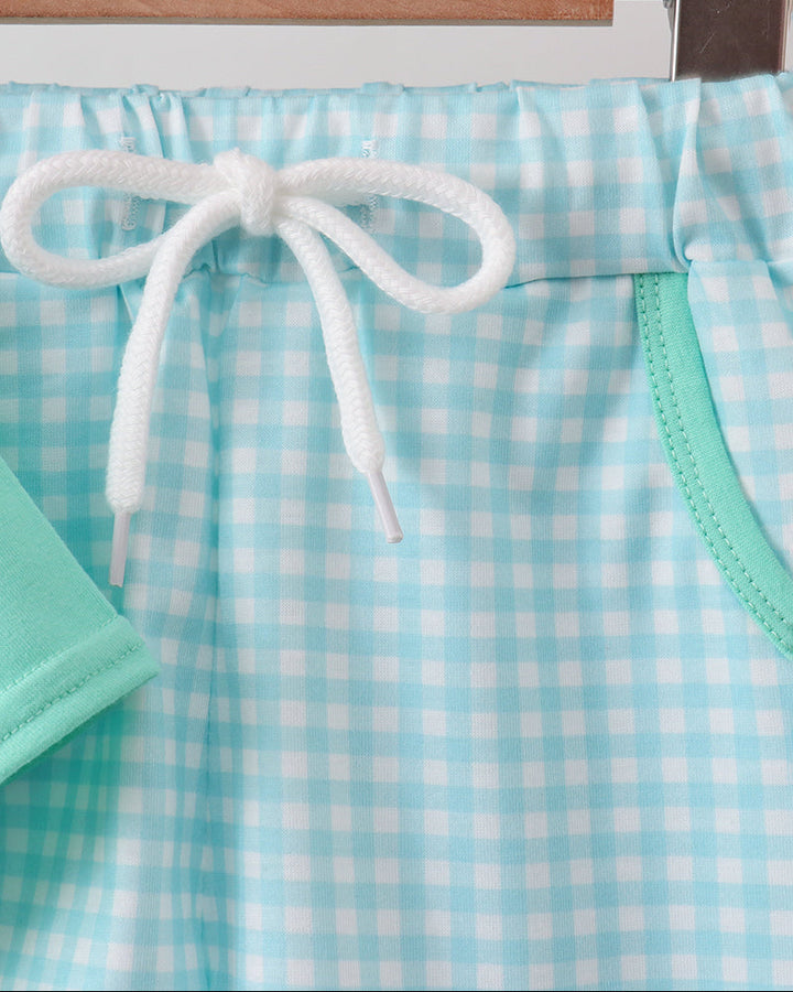 Blue and mint gingham shorts with white drawstring and elastic waist