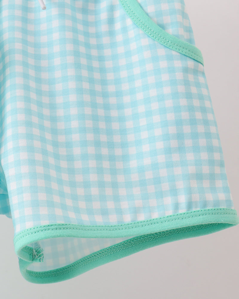 Mint green T-shirt hem with teal trim