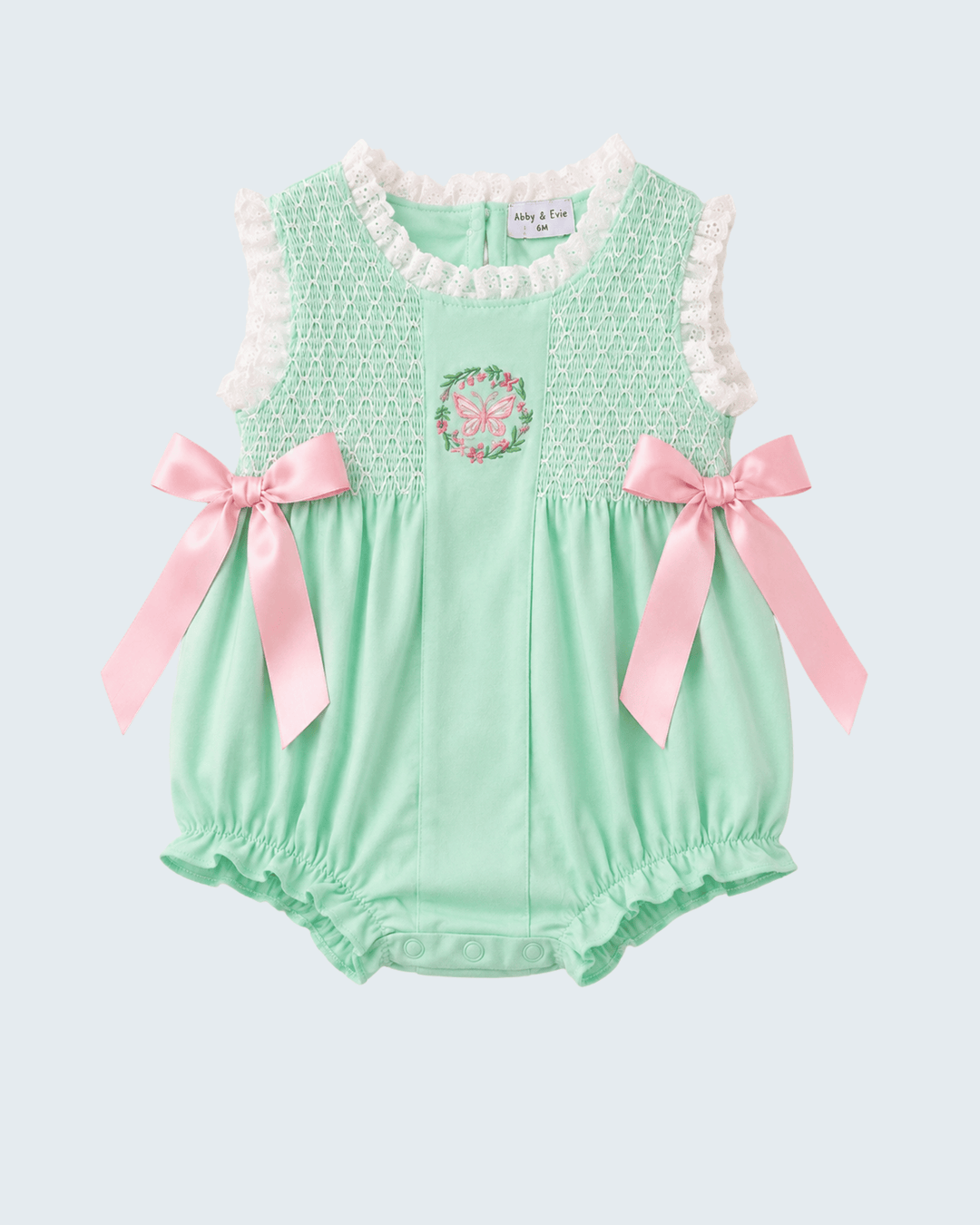 Green Butterfly Smocked Lace Bubble on light grey background