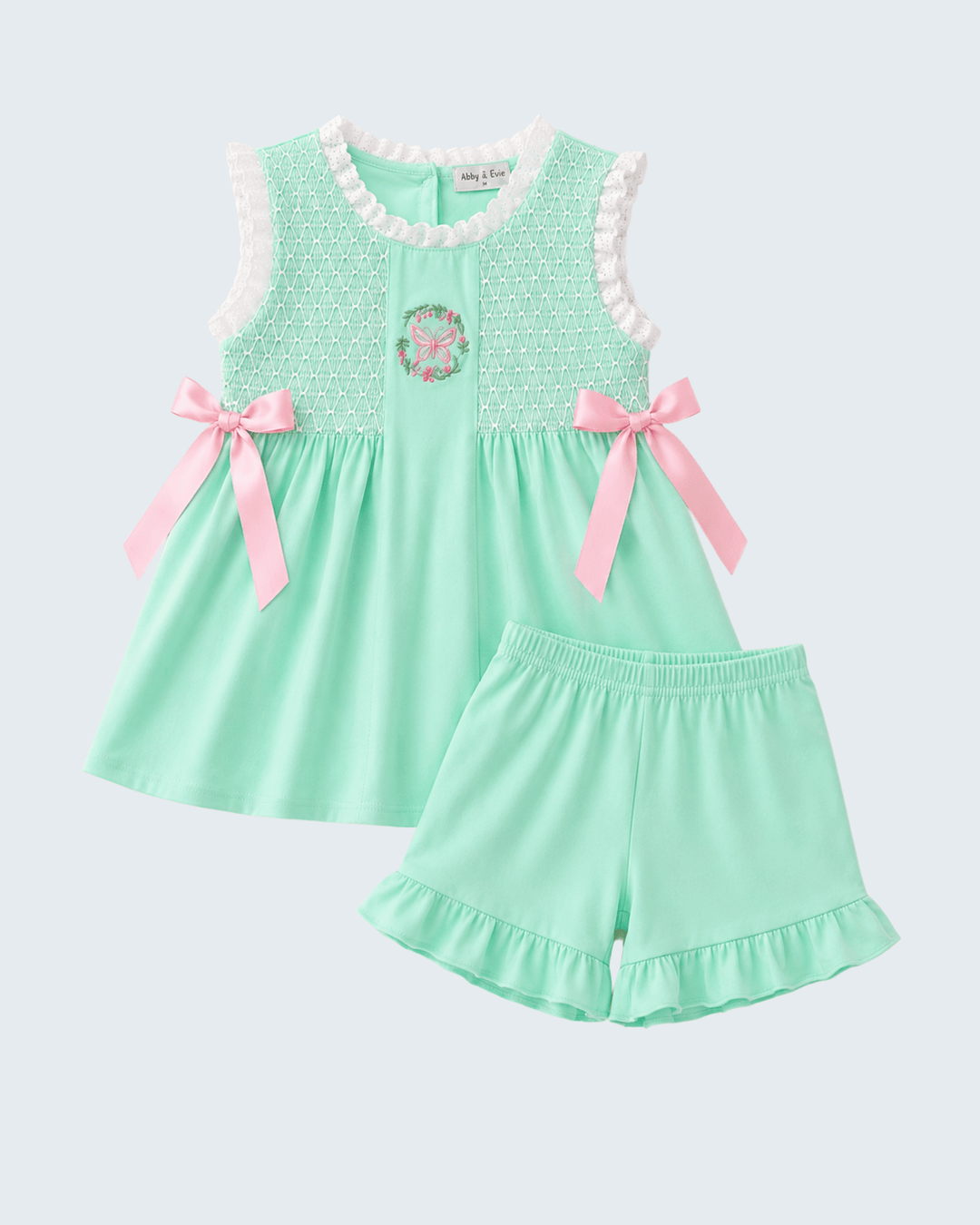 Green Butterfly Smocked Ruffle Shorts Set on light grey background