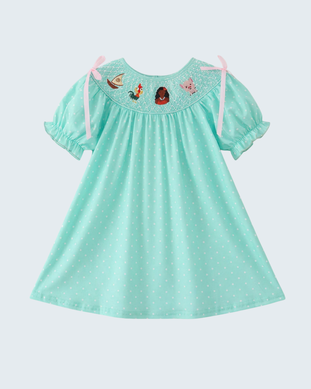 Turquoise smocked dress with dotted skirt, short puff sleeves, character yoke and bows