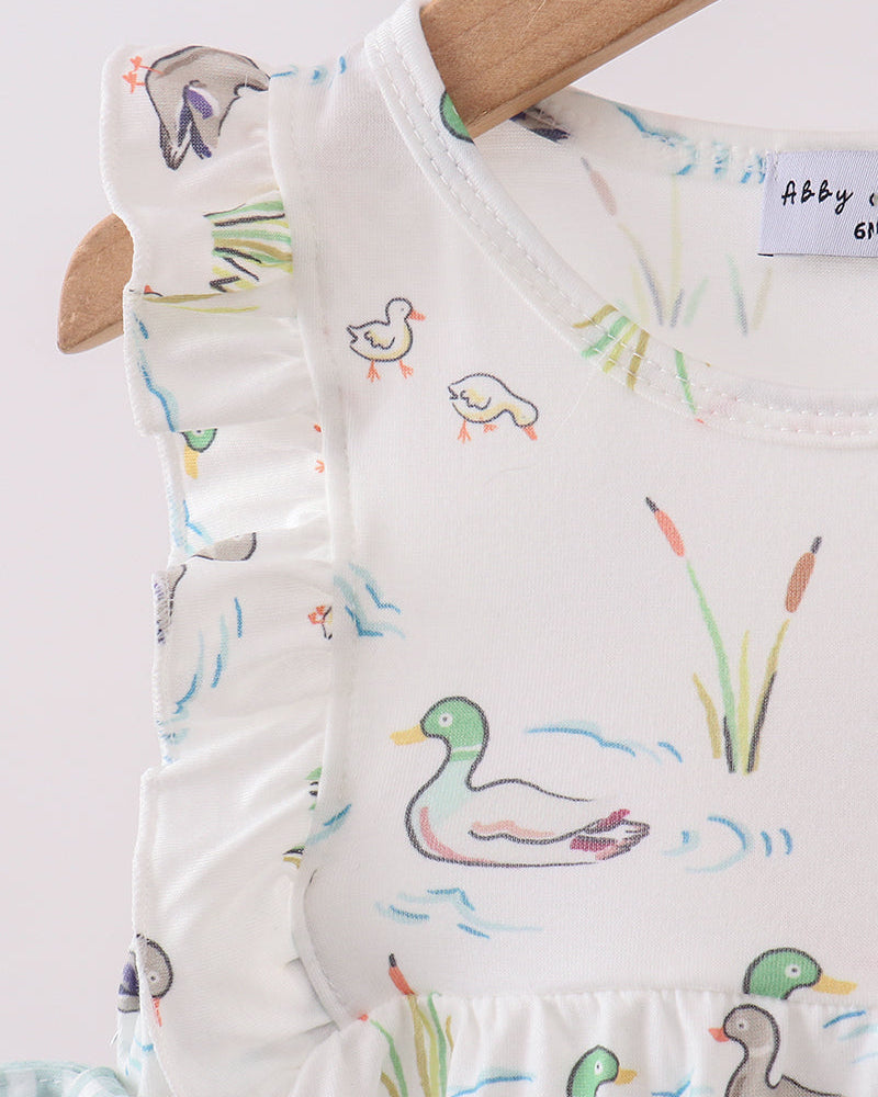 Baby romper with duck pattern on a white background