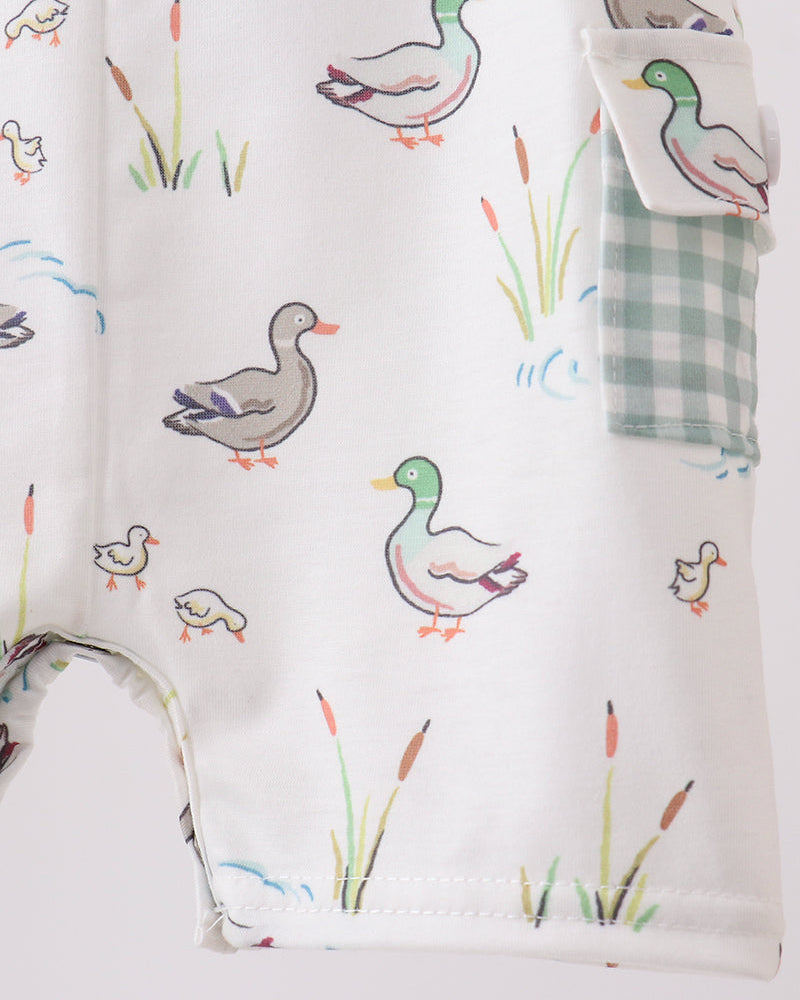 Baby  romper with duck illustrations on a white background