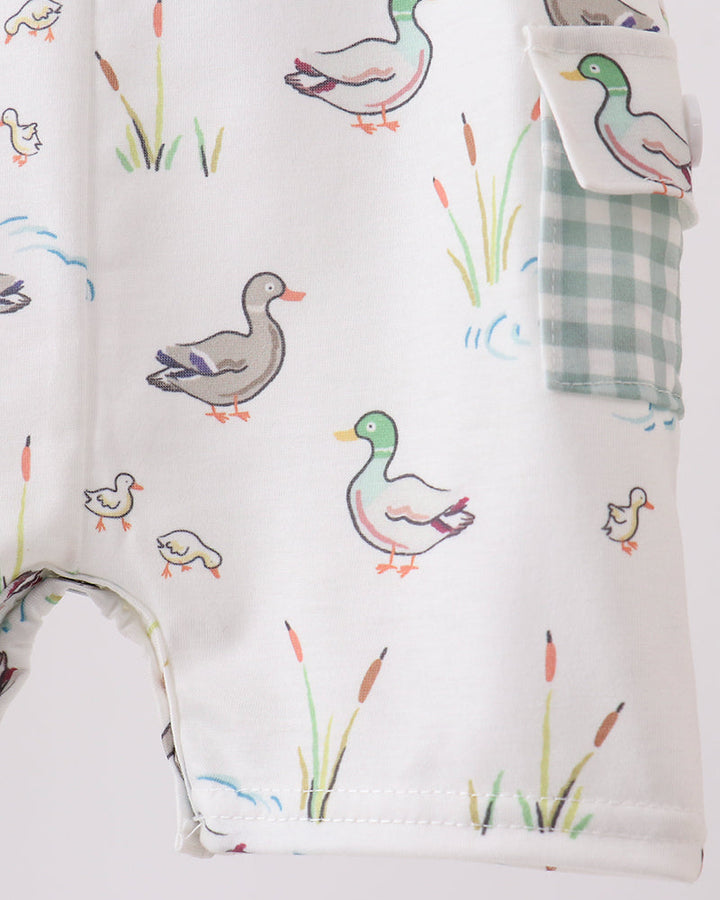 Baby  romper with duck illustrations on a white background