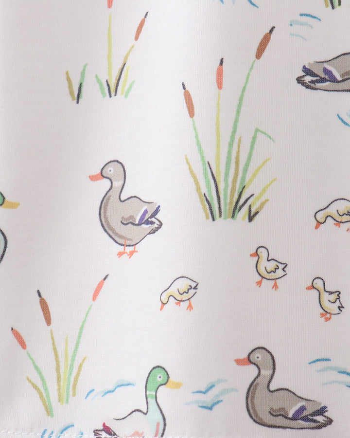 Pattern of ducks and reeds on a white background
