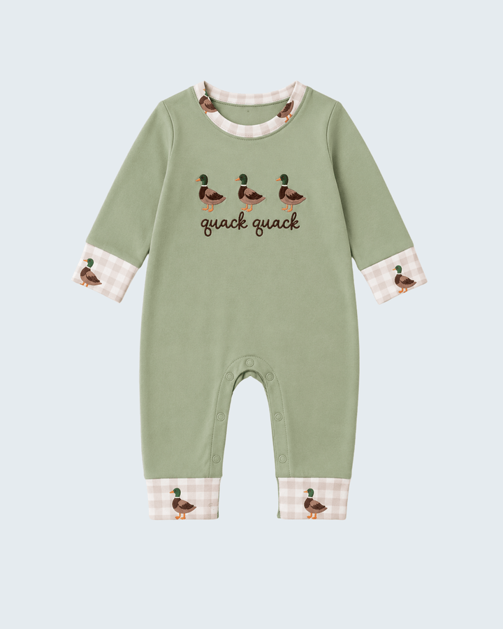 A baby long-sleeve footless romper in sage green, featuring embroidered ducks and the text &