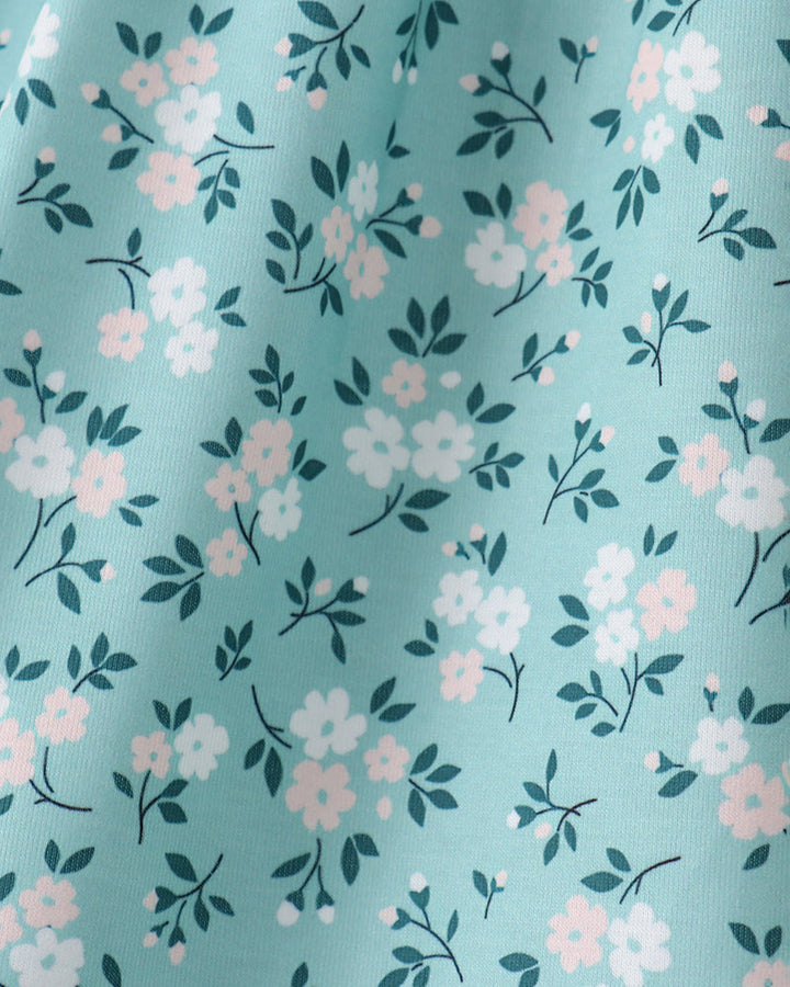 Teal floral fabric with pink and green blooms