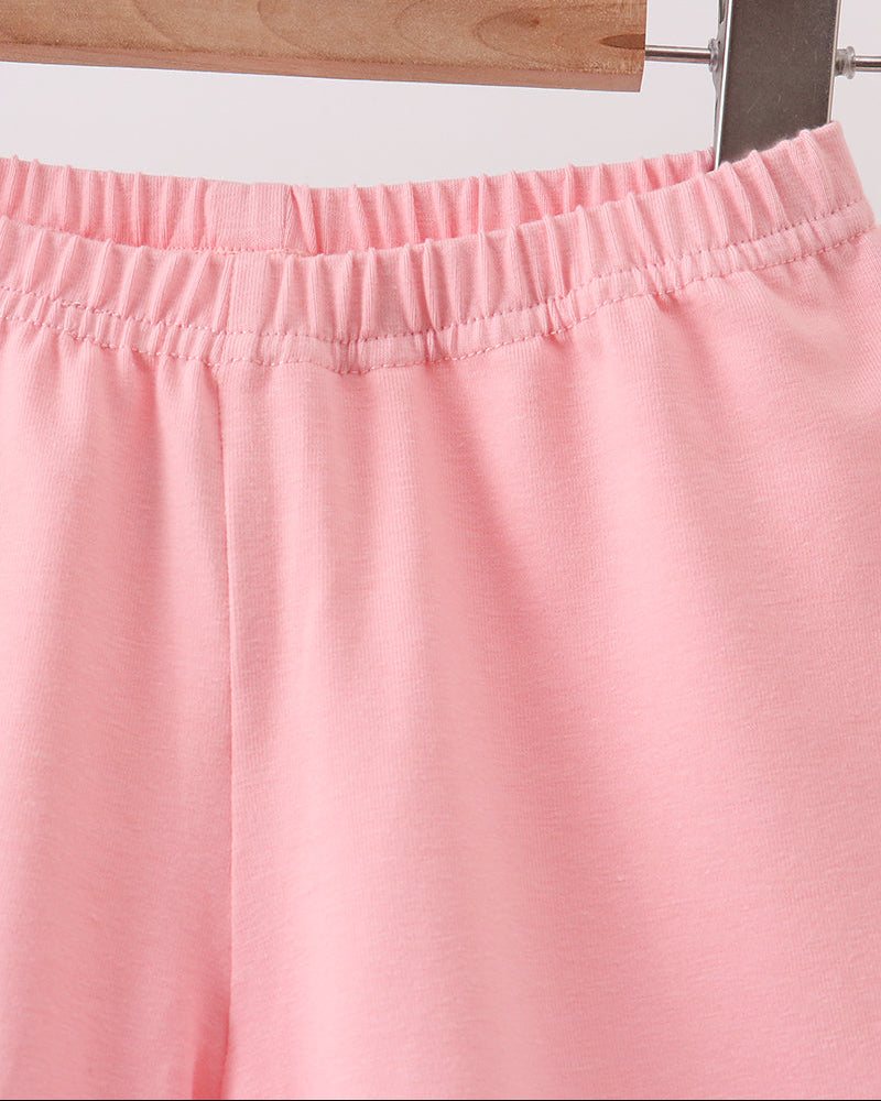 Pink ruffle shorts with elastic waistband and gathered trim