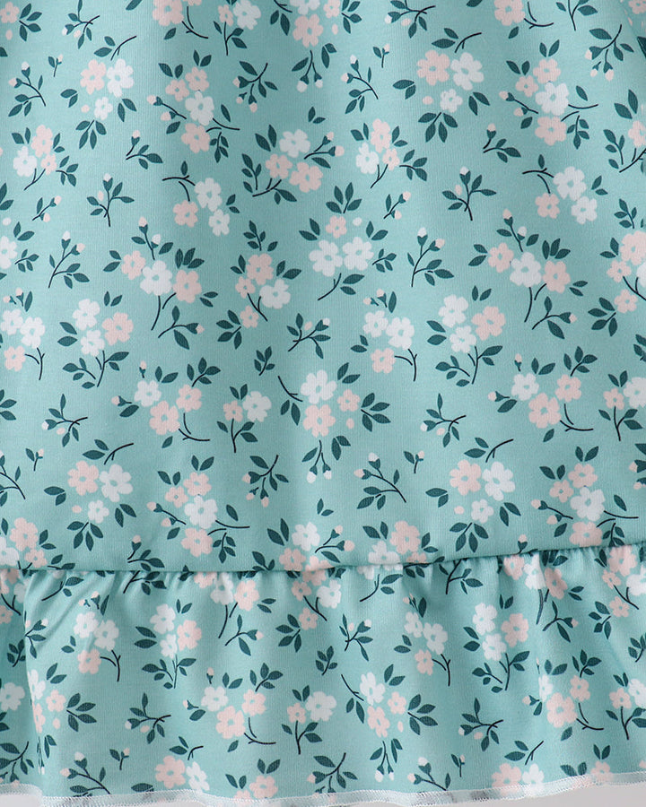 Teal floral dress with gathered lower ruffle hem