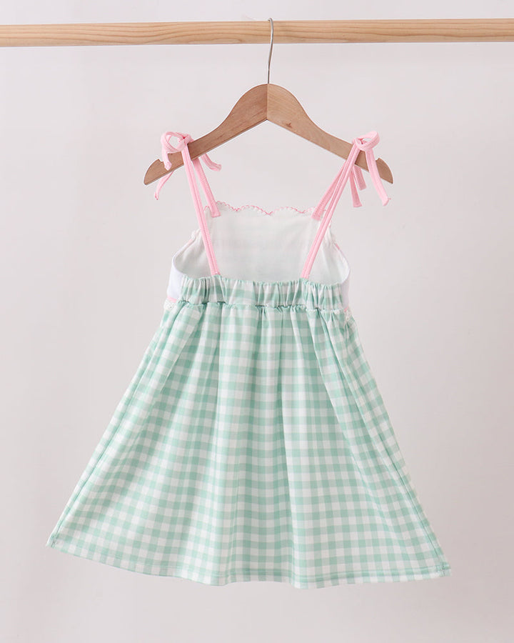 Green Golf Embroidered Dress on wooden hanger