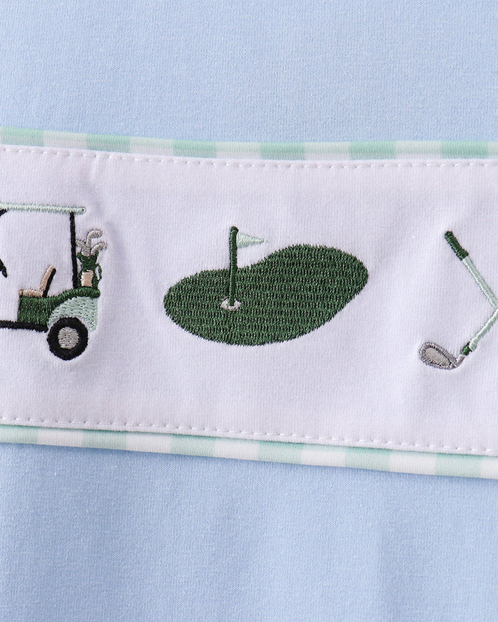 Logo of golf cart on light blue fabric